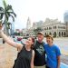 from L-R, Hannah Lins, Dennis Lins and Lori Lins from USA wefie with the backaground of Malaysian iconic building Sultan Abdul Samad in Kuala Lumpur
(11/6/2022). —AZHAR MAHFOF/The Star